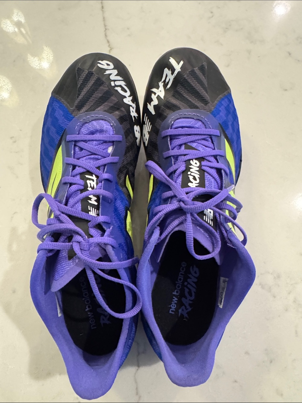 New Balance Women's Sprinting Spikes in Purple, Black and Neon Yellow